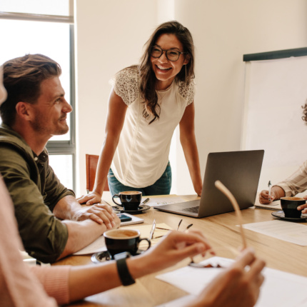 Group Of Multi Ethnic Executives Discussing During A Meeting