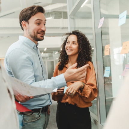 Businesspeople Using Sticky Notes, Agile Methodology For Productivity Working In Modern Office
